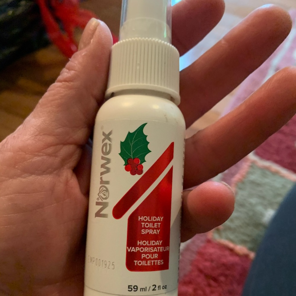Toilet spray